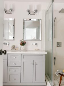 Renovated bathroom in a Chilliwack home, shows sinks and shower that were installed by a plumber