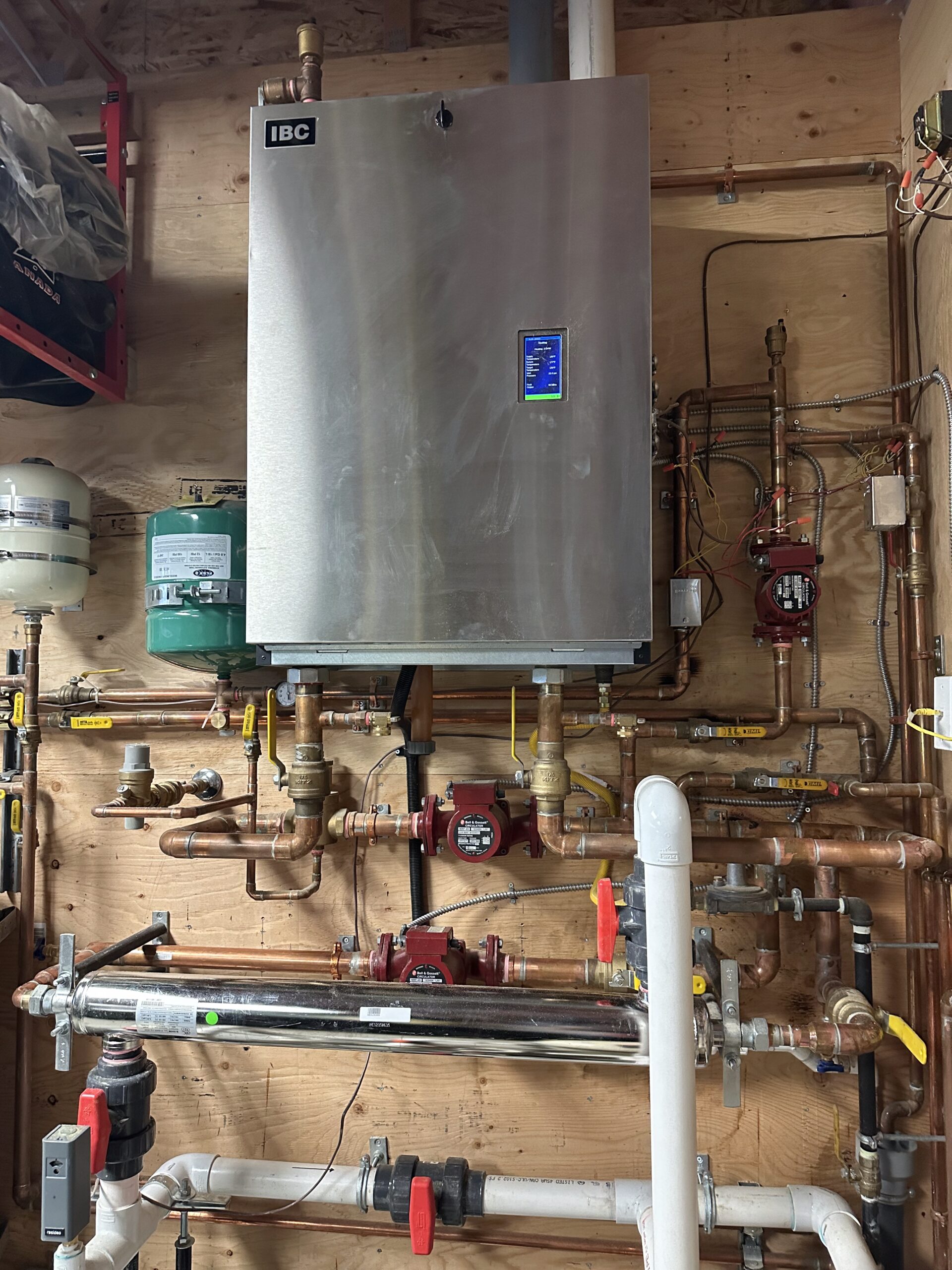 IBC boiler, indirect hot water tank and hydronic heating piping installed in Chilliwack